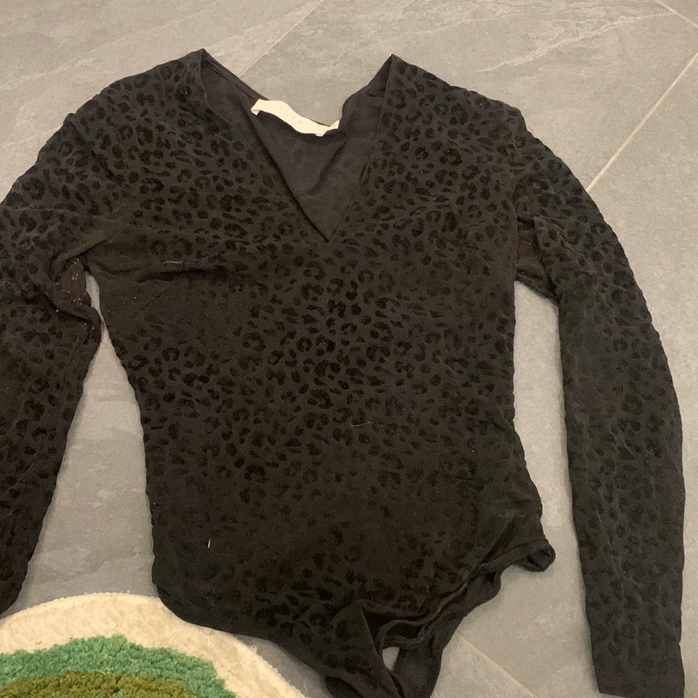 Revolve ASTR black cheeta bodysuit